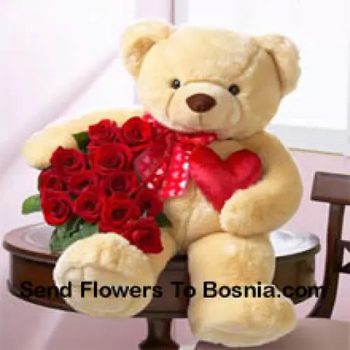 Bunch Of 12 Red Roses With A 24 Inches Tall Teddy Bear (Please Note That We Reserve The Right To Substitute The Teddy Bear With A Teddy Bear Of Equal Value And Size In Case Of Non-Availability Of The Same. Limited Stock. While Substituting The Product We Will Ensure That The Same Exclusivity Is Maintained)
